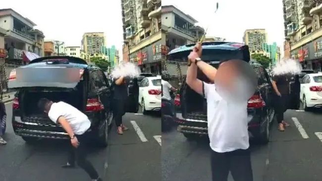 男子别停他人车辆后当街狂砸玻璃！警方：刑拘(图1)