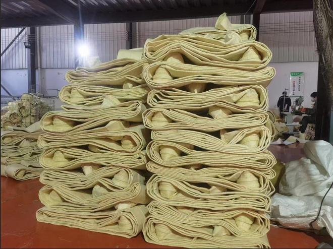 氟美斯滤袋与玻璃纤维及合成化纤耐高温滤袋的性能对比分析